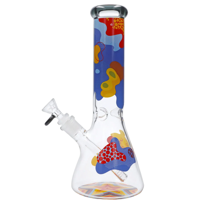 Angled front view of the Famous Design Papaya Water Pipe - 12in. showing colorful abstract pop‑art patterns on a clear glass beaker with the downstem and bowl visible.