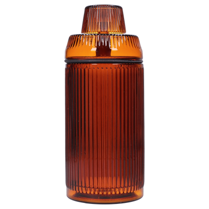 Front view of the Medusa Deco Gravity Bong - Baltic Amber, showcasing its ribbed glass body and amber hue against a plain background.