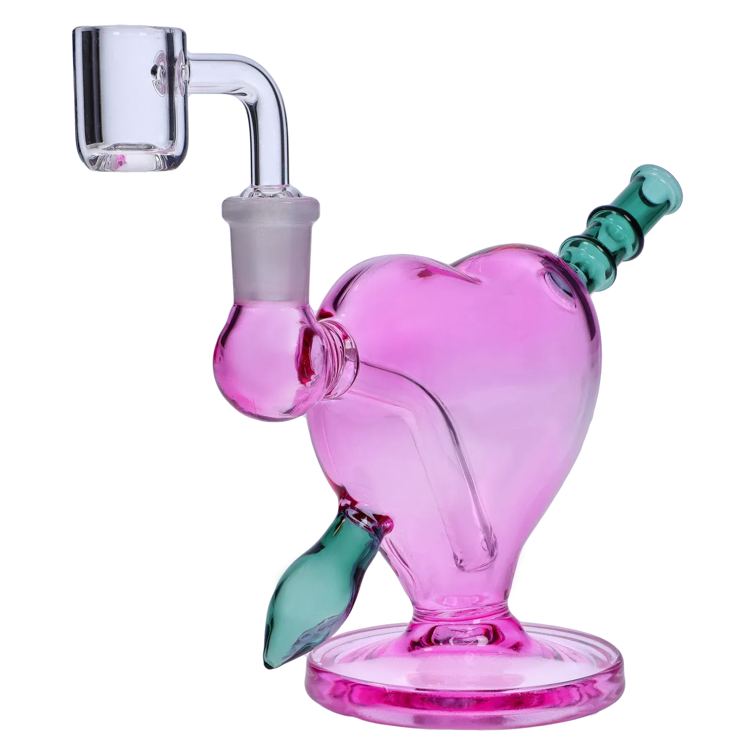 Close-up three-quarter view of the Heart Bong w/Bowl + Banger showing a pink heart-shaped glass body with a green angled mouthpiece and clear quartz banger.