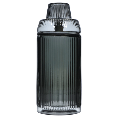 Front view of the Medusa Deco Gravity Bong - Charcoal, showcasing its sleek, dark glass design and vertical ribbed texture.