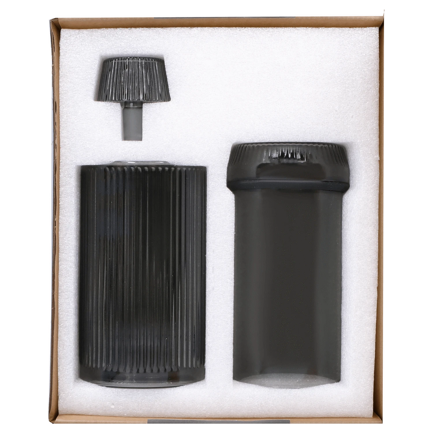 Front view of the Medusa Deco Gravity Bong - Charcoal, presented in its packaging against a white foam insert.