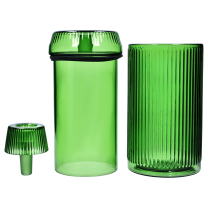 A front view of the Medusa Deco Gravity Bong - Emerald, showcasing its sleek, cylindrical shape and vibrant green hue.