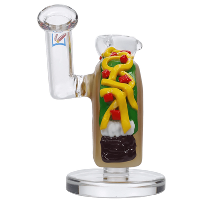 A studio shot of the 4-inch DHC Originals Taco Dual-Use Water Pipe, resembling a taco with a clear glass body and colorful accents.