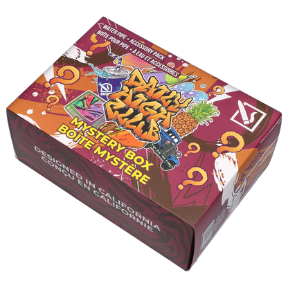 Angled top-down view of the colorful DHC - Mystery Box - Happy Holi-blaze showing graffiti-style artwork, pineapple and car illustrations, and question marks.