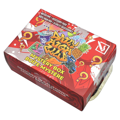 Angled top-down view of the red DHC - Mystery Box - Spaced Out with colorful graffiti graphics, pineapple illustration, and question marks.