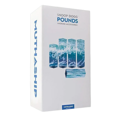 Angled front view of the Snoop Dogg Pounds-Mothership Water Pipe-Black box showing ocean wave graphics and blue "POUNDS" branding on a white background