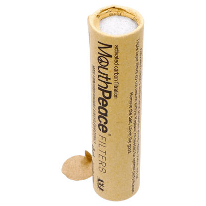 Close-up of Moose Labs Mouthpeace Filter Replacements, showing a stack of white cylindrical filters against a blurred background.