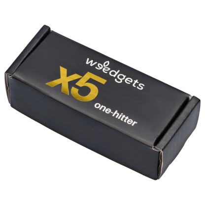 Angled top-down view of the black Wgedgets X5 One Hitter box showing gold "X5" lettering and white brand text on the lid.
