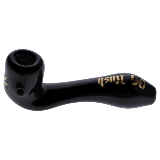 Side view of the black Puff Puff Pass Strains OG Kush Sherlock -Black - 4in. glass pipe with gold lettering along its curved stem.