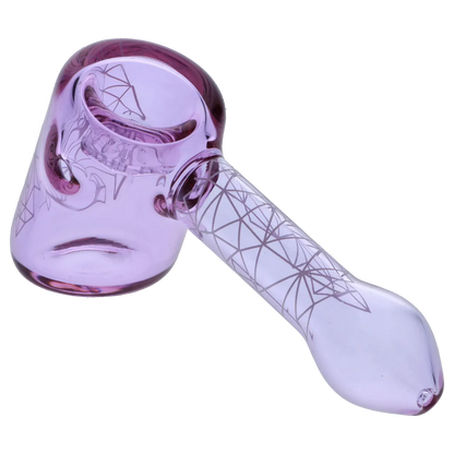 Angled close-up of the purple Famous Design Space Hammer Pipe-Purple- 5in. showing its carved bowl, side carb hole, and geometric line etchings along the handle