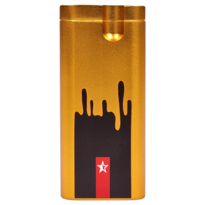 Close-up front view of the gold Famous Design Surrender Aluminum Dugout - Gold showing its rounded top, black dripped graphic and small red star emblem.