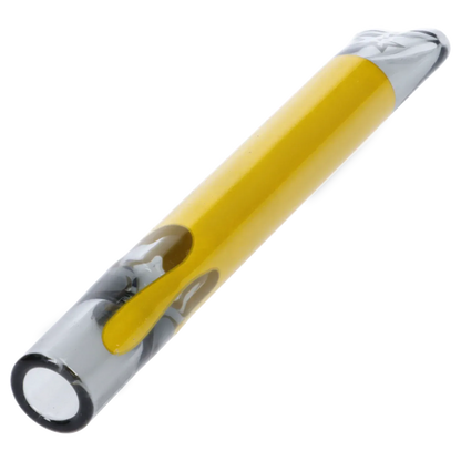 Angled close-up of the Famous Design Surrender Chillum - Transparent Black - 4in., showing its transparent black glass with a yellow inner rod and rounded mouthpiece.