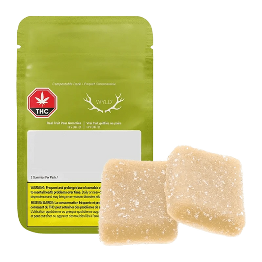 Real Fruit Pear 1:1 Gummies packaging displays a close-up of a pear on a dark background with branding details.