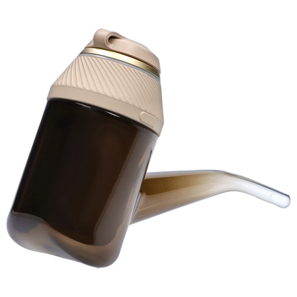 Angled close-up of the tan and brown Proxy – Desert bottle showing its textured twist cap and spout against a white background