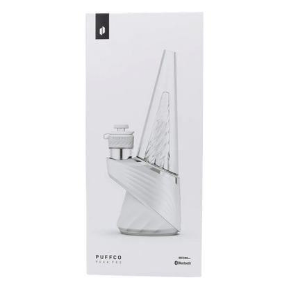 Tall studio-shot of the white Puffco Peak Pro 3DXL – Pearl angled to show its twisted clear glass cone and textured base.