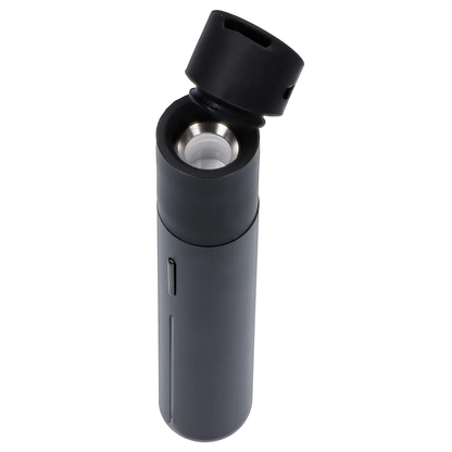 Top-down close-up of the black Puffco Pivot - Onyx showing the open angled chamber and matte body against a gray background