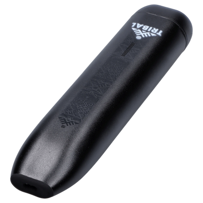 Angled close-up of the black Tribal Aerolith Dry Herb Vaporizer showing its textured surface, vent holes, and white upside-down TRIBAL logo.
