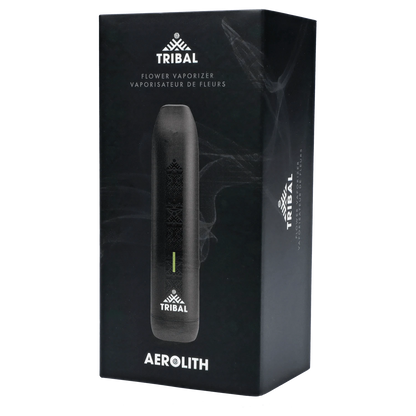 Angled front view of the black packaging showing the Tribal Aerolith Dry Herb Vaporizer silhouette and logo against a smoky dark background