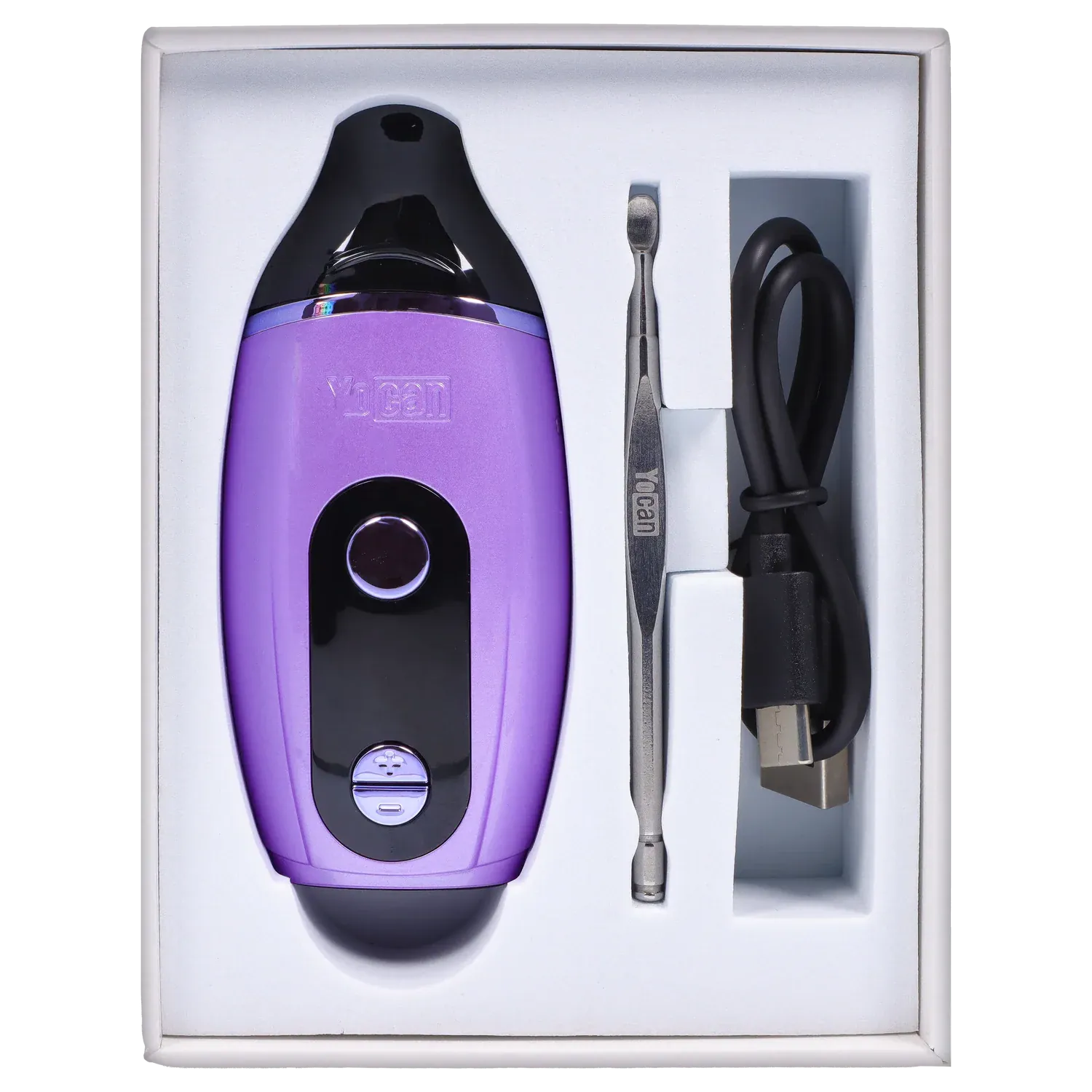Top-down view of the purple Yocan Iris Concentrate Vape Pen Kit - Purple nestled in foam with a metal dab tool and USB charging cable alongside.