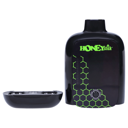 Close-up front view of the black HoneyStick Duo Variable Voltage Plus with neon green honeycomb graphics and its detached bottom tray.