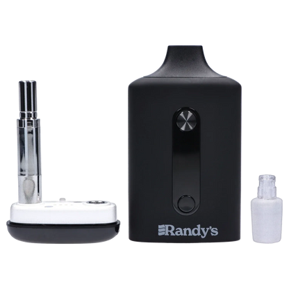 Close-up front view of the matte black Randy's Inspo Dual 510 Battery - Noir Black standing between two silver and white accessories.
