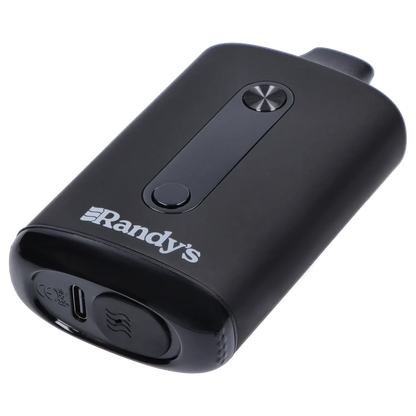 Angled close-up of the noir black Randy's Inspo Dual 510 Battery showing its matte curved body, central button strip, and USB-C port.