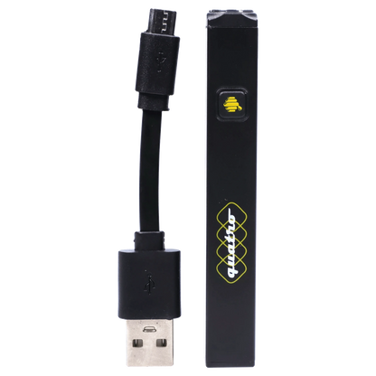 Vertical close-up of the black HoneyStick Quatro Variable Voltage Vape Black battery and its USB charging cable showing a yellow logo button and side branding.