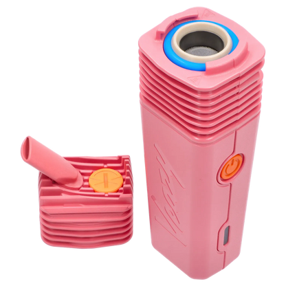 Top-down close-up of the Charming Pink Storz & Bickel Veazy Vaporizer showing the ribbed body, open mouthpiece, blue-lined oven and orange power button.