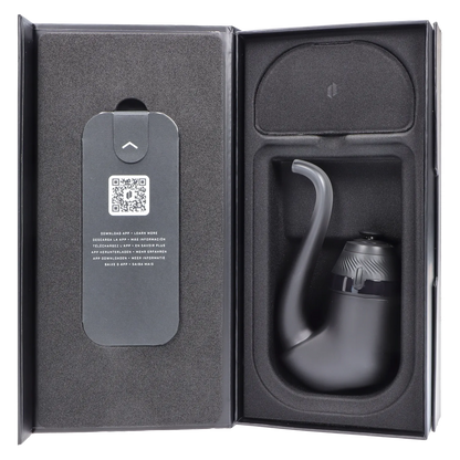 Top-down view of the Puffco Proxy 2.0 - Onyx nestled in black foam packaging with its curved mouthpiece and QR code insert visible.