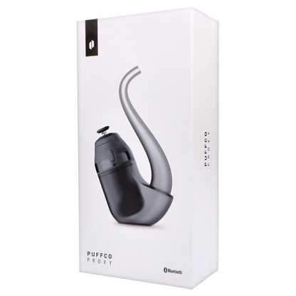 Angled close-up of the Puffco Proxy 2.0 - Onyx on white packaging, showing the curved mouthpiece and matte black body.