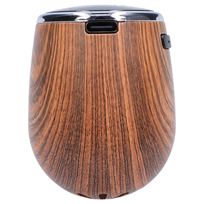 Top-down close-up of the palm wood finish on the Cipher Nautilus V3 Dry Herb Vaporizer - Palm Wood showing wood grain, rounded edges, USB-C port and side button.
