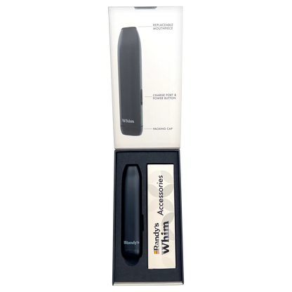 Top-down view of the Midnight Black Randy's Whim Dry Herb Vaporizer and its accessories nestled in black foam packaging.