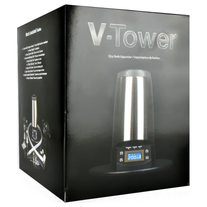 Three-quarter view of the black boxed Arizer V-Tower Desktop Vaporizer showing the stainless steel chamber and blue-lit digital display.