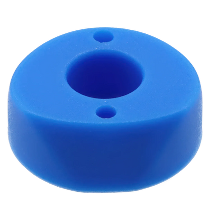 Close-up angled view of the bright blue Famous X Wraith Vaporizer Silicone Mouthpiece Attachment showing its circular central bore and two small vent holes.