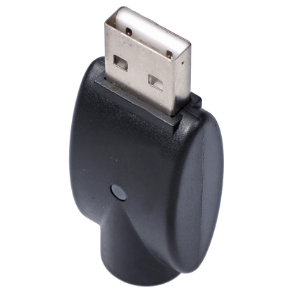 Close-up angled view of the black Atman USB charger showing its metal USB-A plug and textured plastic body.