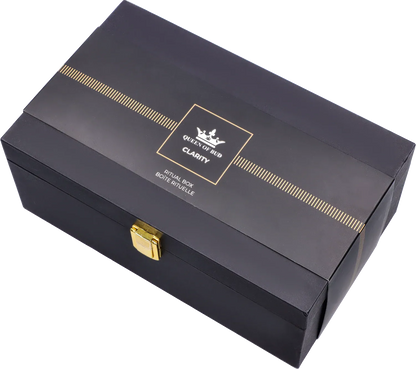 Angled top view of the black Queen of Bud: Clarity Ritual Box – Candle, Zippo, and Crystal with gold stripe detailing and a small gold latch.