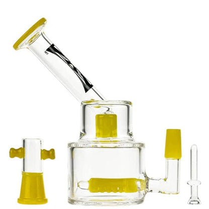 A three-quarter view of the 6-inch Evolution Morning Glory Dab Rig with a yellow dome and banger, showing its clear glass construction.
