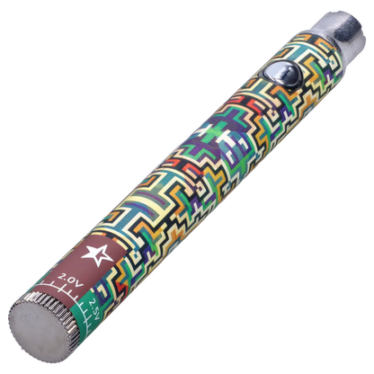 Angled close-up of a colorful patterned Famous Design Lit Sticc VV Battery - Mixed Design showing its metal tip, raised power button, and geometric print.
