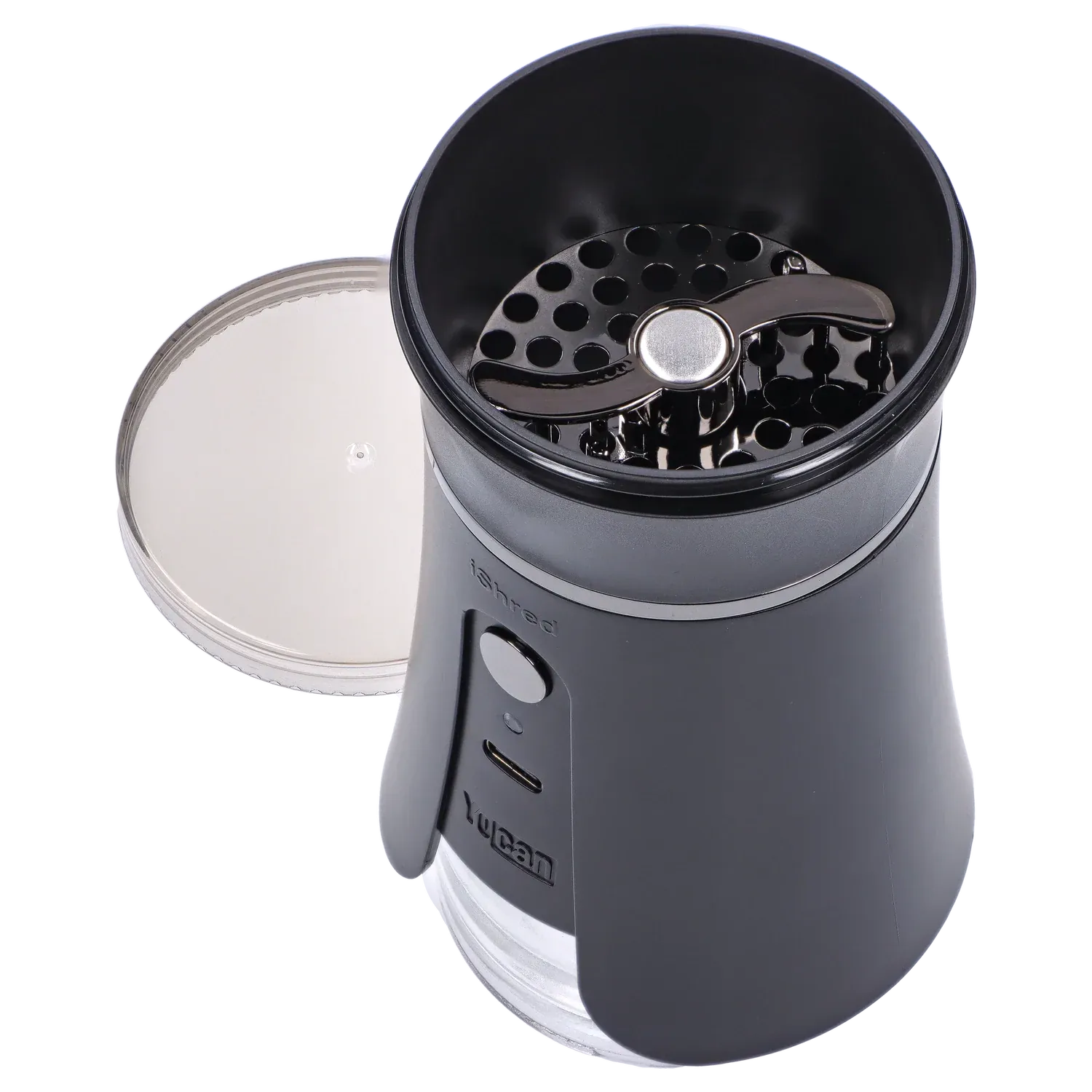 Top-down view of the open Yocan iShred Electronic Grinder – Black showing the circular perforated grinding plate and curved chrome rotor against a pale background