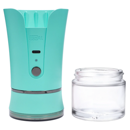 Close-up front view of the green Yocan iShred Electronic Grinder showing its rounded top, power button and clear removable jar.