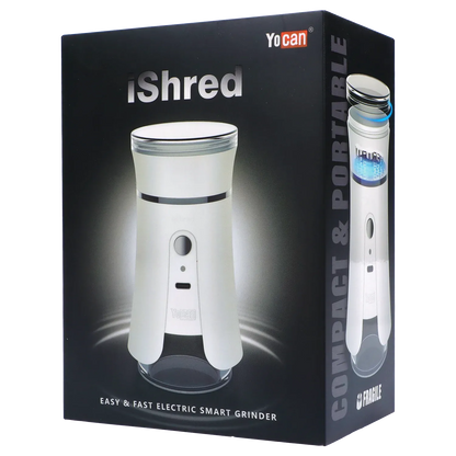 Angled front view of the ivory Yocan iShred Electronic Grinder on its black product box, spotlighted against a dark gradient background
