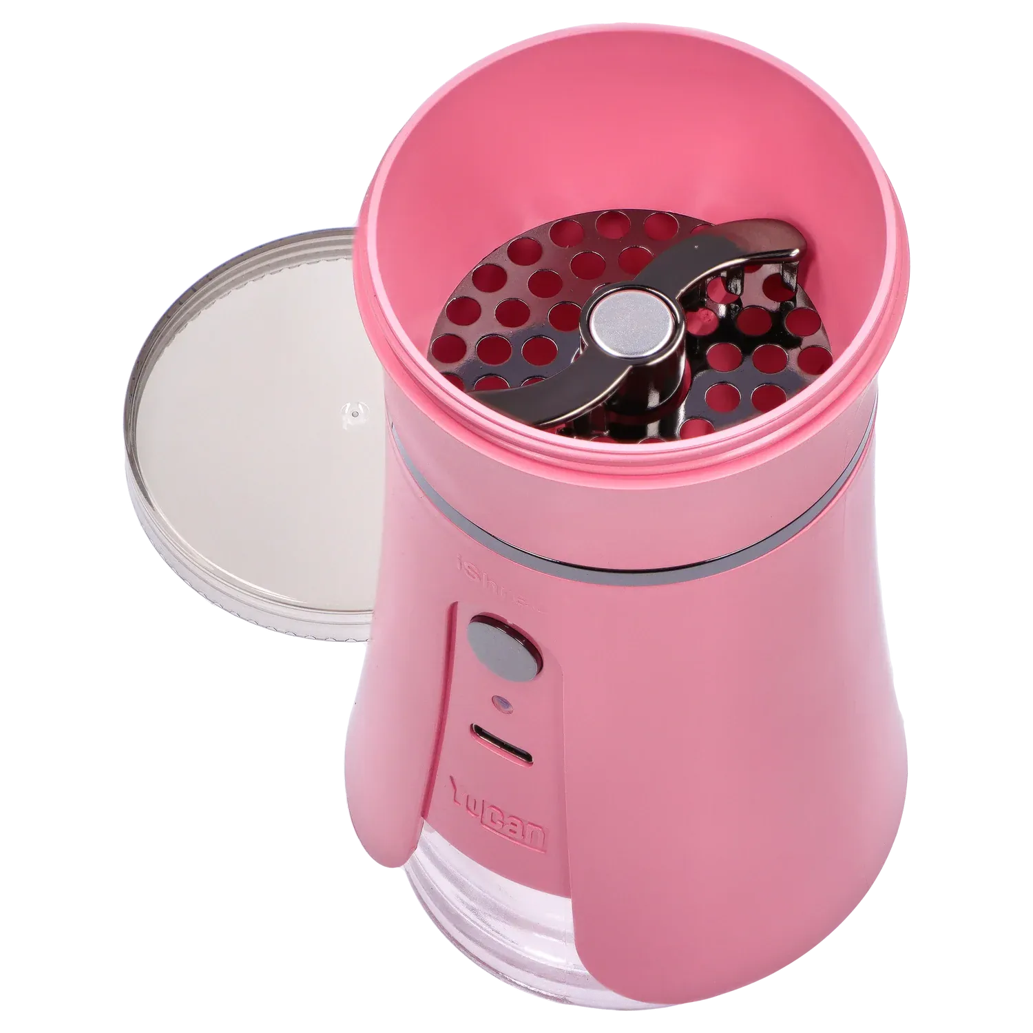 Top-down close-up of the open Yocan iShred Electronic Grinder – Pink showing the circular perforated grinding plate and twin metal blades inside.
