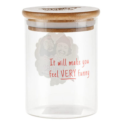 Clear front view of the C&C Heads Stash Jar - Mittel with a bamboo lid and red text reading "It will make you feel VERY funny."