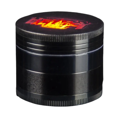 Close-up angled view of the black Hellboy Logo 3-Stufen Grinder showing the textured screw-top edge and fiery logo on the lid.