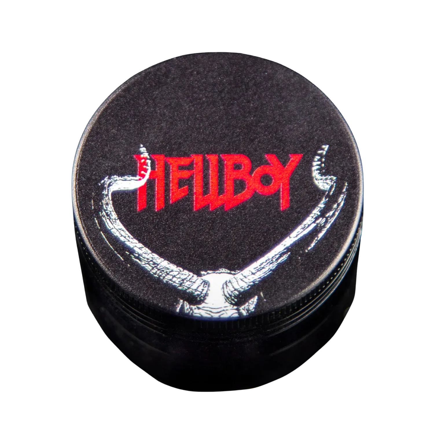 Top-down view of the black Hellboy Hörner 3-Stufen Grinder - Schwarz lid featuring a red "HELLBOY" logo and white horn artwork.