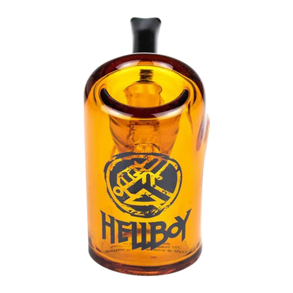 Close-up front view of the amber Hellboy Sherlock Pfeife - Gelb showing its rounded mouthpiece, printed Hellboy logo, and glossy glass surface