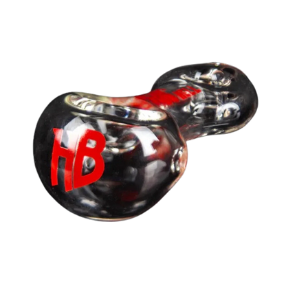 Angled close-up of the clear glass Hellboy Sherlock Pfeife - Klar showing a red "HB" logo and spoon-shaped bowl reflections.