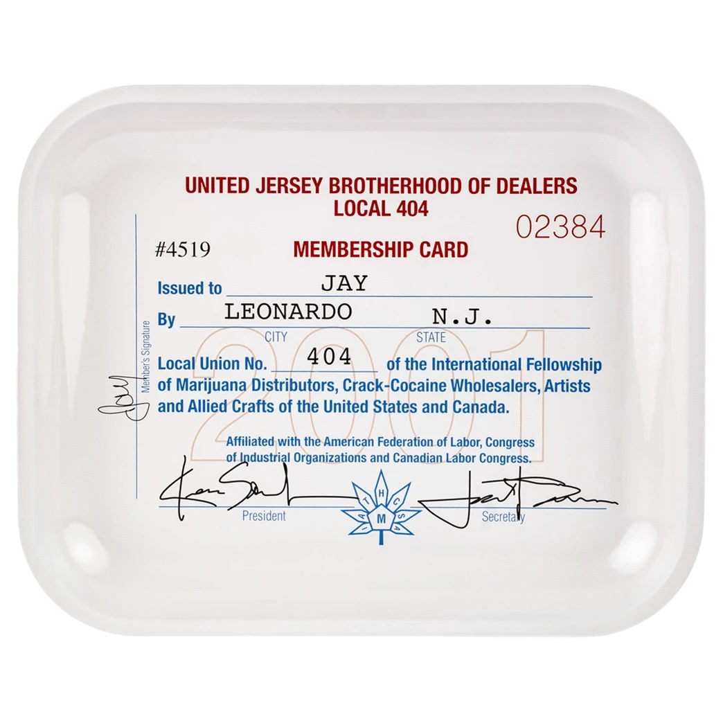 Top-down view of a white JSB Signature Tray-Large printed with a faux membership card design, bold red header, blue body text, signatures and rounded corners.