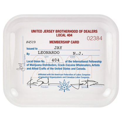 Top-down view of a white JSB Signature Tray-Large printed with a faux membership card design, bold red header, blue body text, signatures and rounded corners.