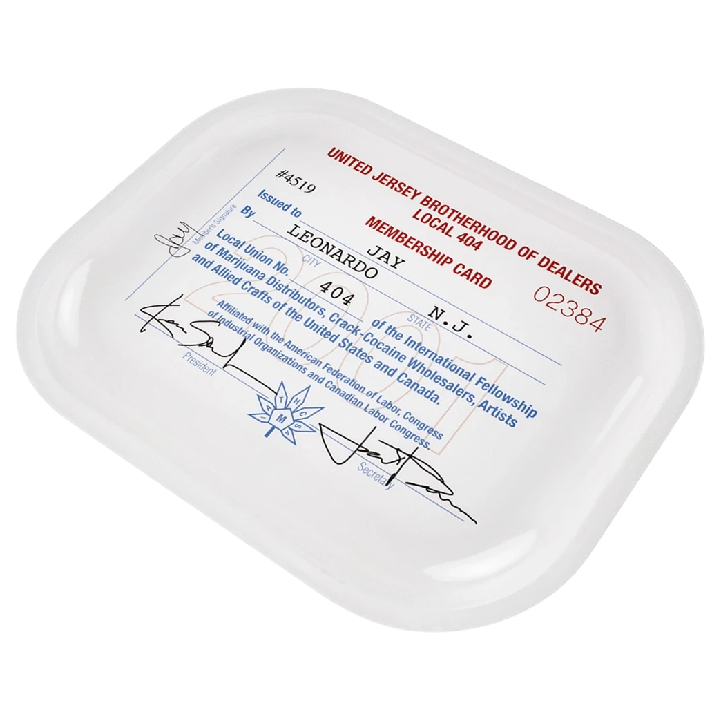 Angled top-down view of the white JSB Signature Tray-Small featuring a vintage red and blue "United Jersey Brotherhood of Dealers" membership card print.